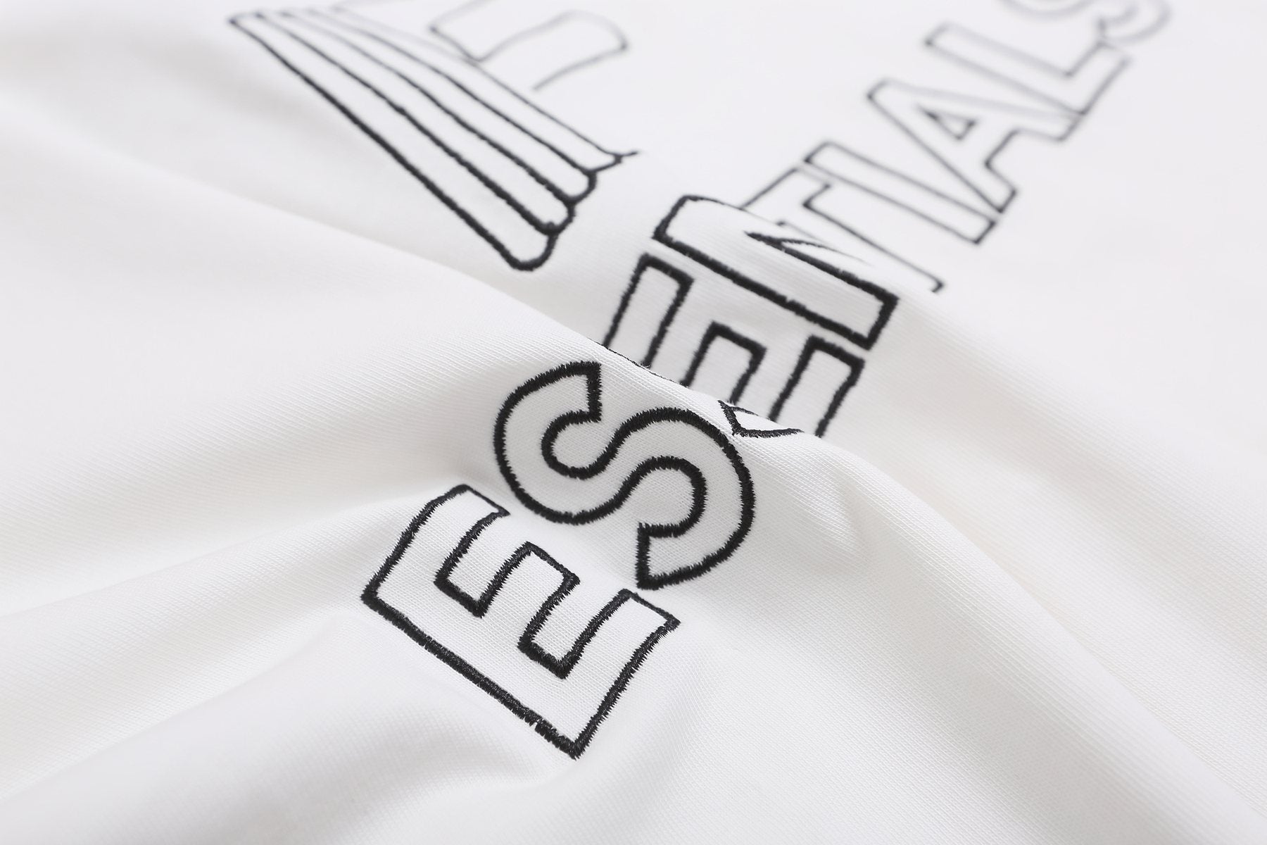 ESSENTIALS F-Letter Embroidered Graphic T-Shirt — fabric_closeup