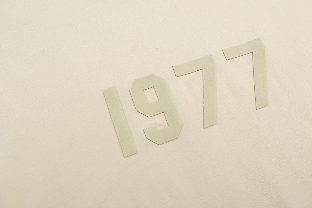 ESSENTIALS 1977 Tonal Wordmark Mock-Neck T-Shirt — detail