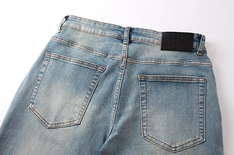 LOSTSHDWS Light Blue Daisy Applique Flared Jeans — detail
