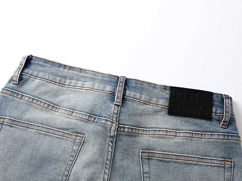 LOSTSHDWS Daisy Appliqué Flared Jeans — detail
