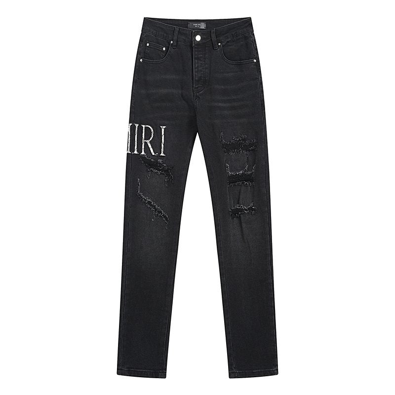 AMIRI Distressed Slim Tapered Jeans — hero