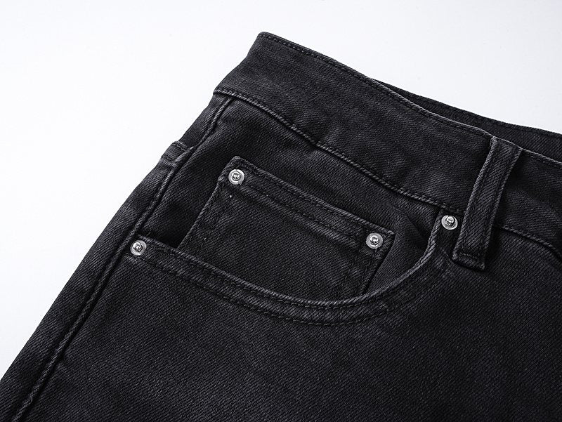 AMIRI Distressed Slim Tapered Jeans — detail
