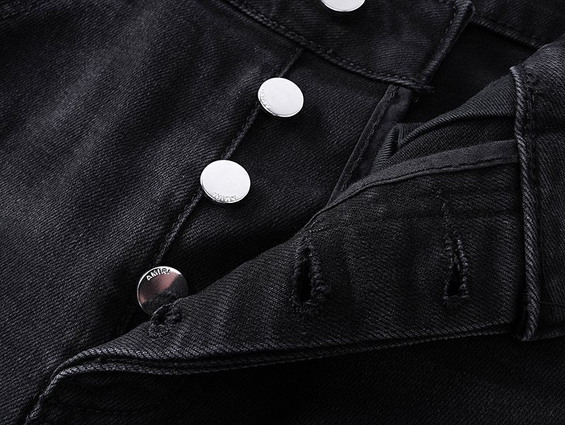 AMIRI Distressed Slim Tapered Jeans — detail