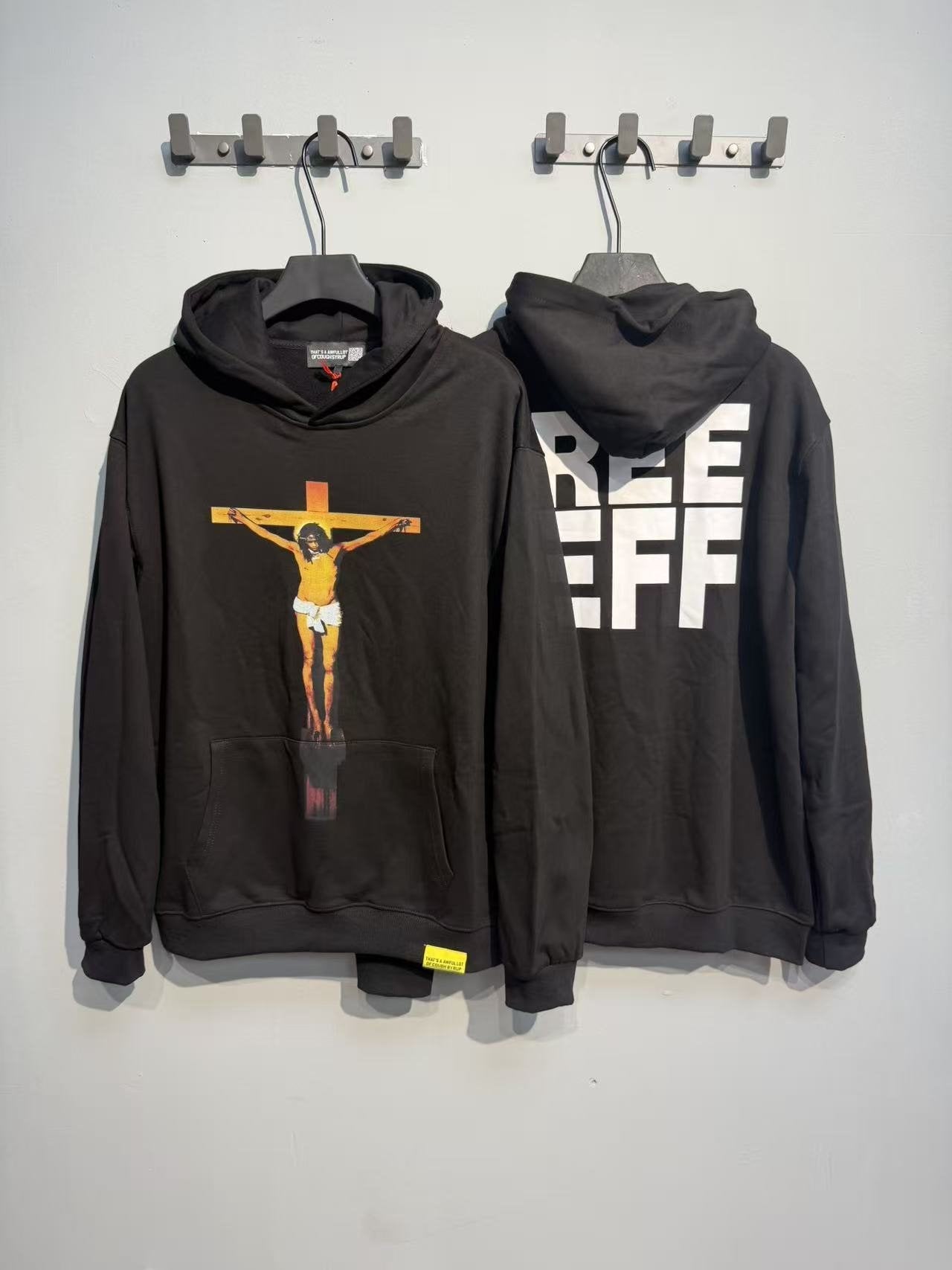 THAT'S A AWFUL LOT OF COUGH SYRUP Crucifixion Graphic Pullover Hoodie — context