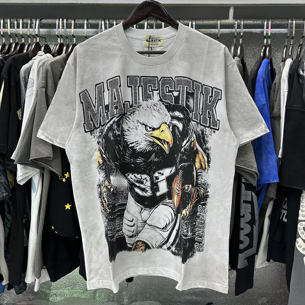 MAJESTIK Eagle Football Rhinestone Graphic T-Shirt — context
