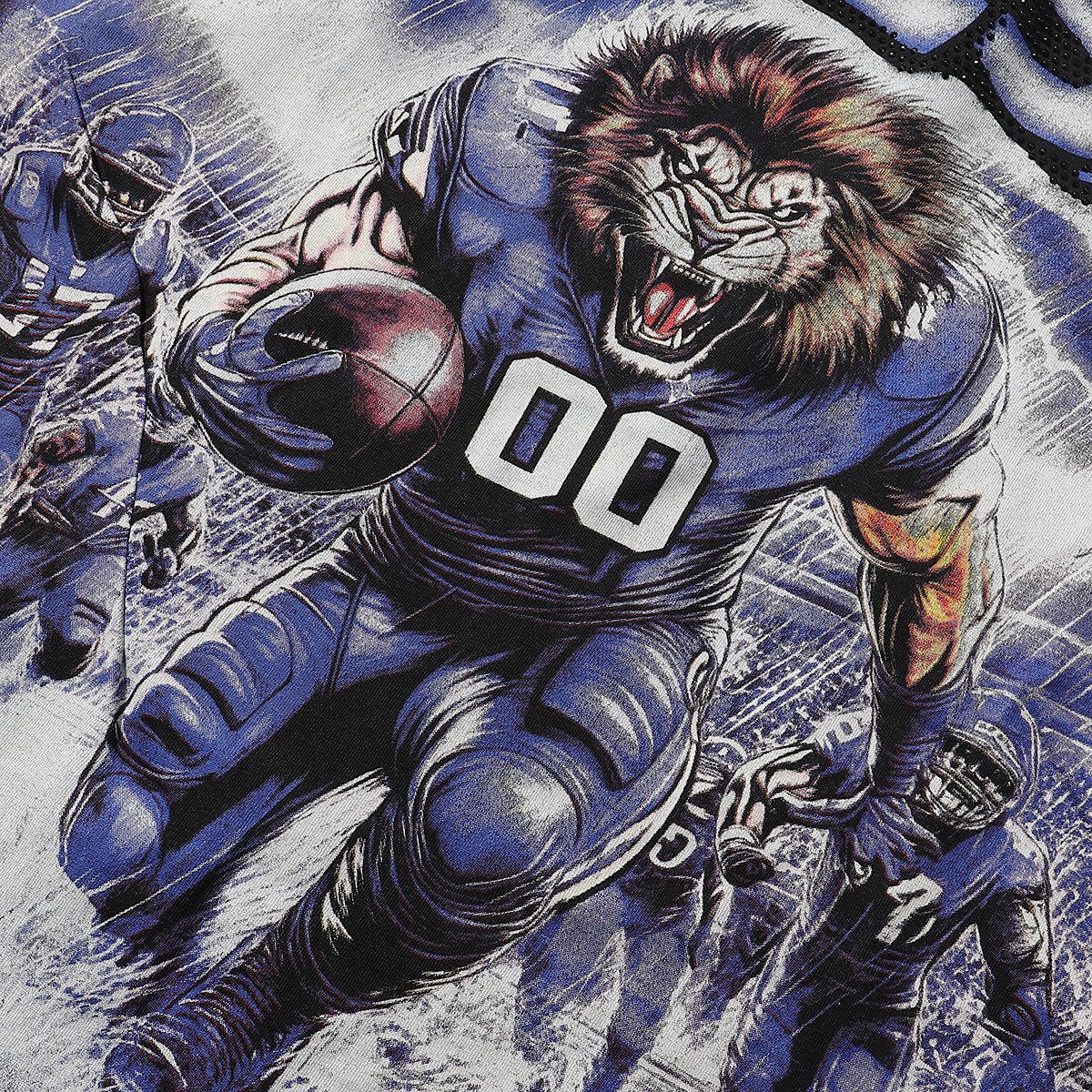 MAJESTIK Lion Football Rhinestone Crop T-Shirt — fabric_closeup