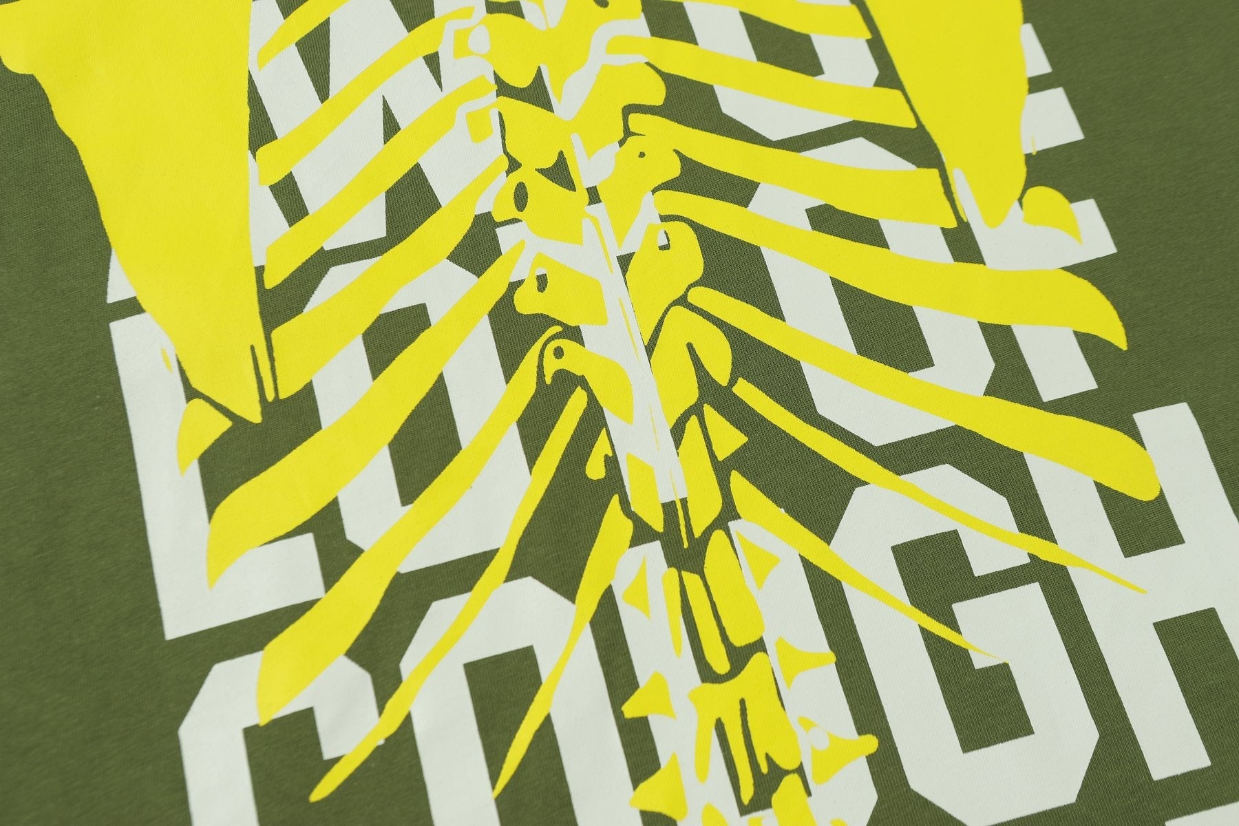 THAT'S A AWFUL LOT OF COUGH SYRUP Ribcage Graphic T-Shirt — detail