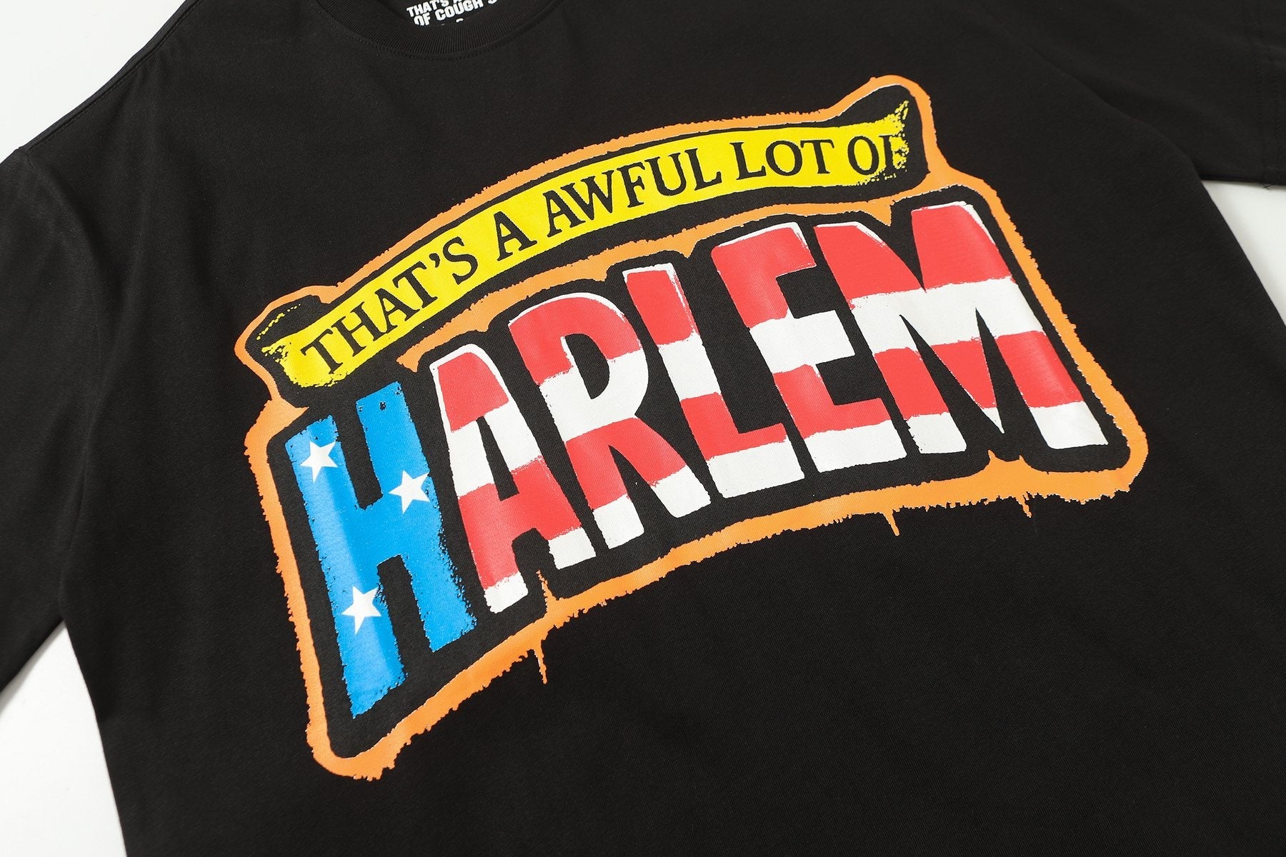THAT'S A AWFUL LOT OF COUGH SYRUP Harlem Eagle Graphic T-Shirt — detail