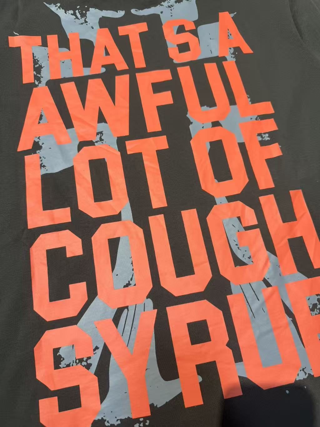 THAT'S A AWFUL LOT OF COUGH SYRUP Cross Graphic Short-Sleeve T-Shirt — detail