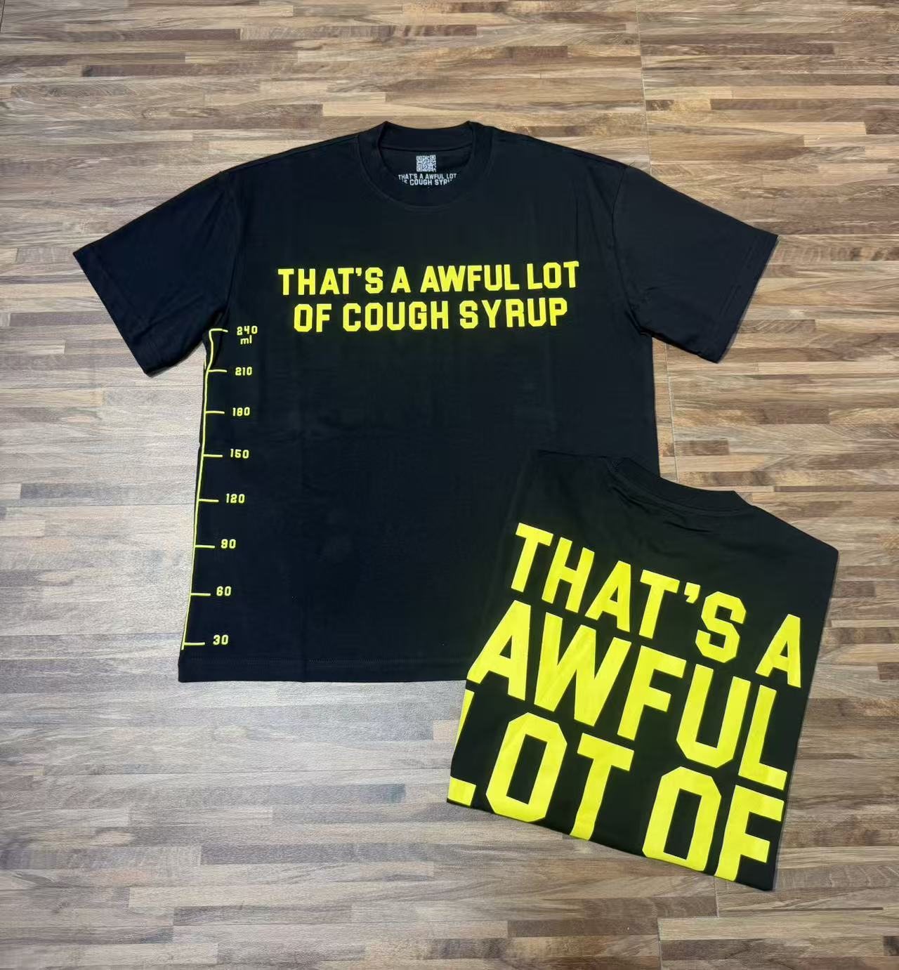 THAT'S A AWFUL LOT OF COUGH SYRUP Yellow Wordmark Short-Sleeve T-Shirt — context