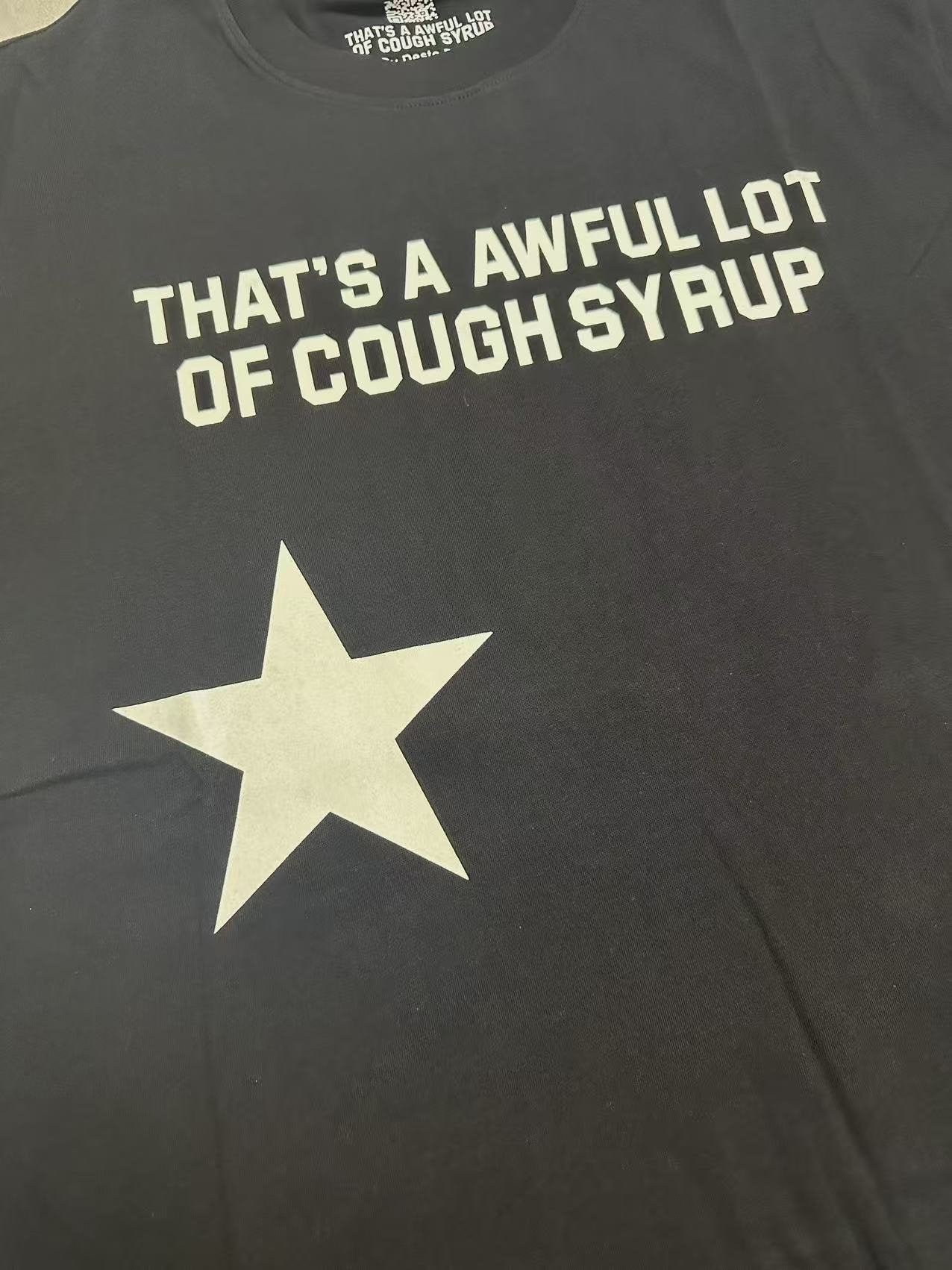 THAT'S A AWFUL LOT OF COUGH SYRUP Star Graphic Short-Sleeve T-Shirt — detail
