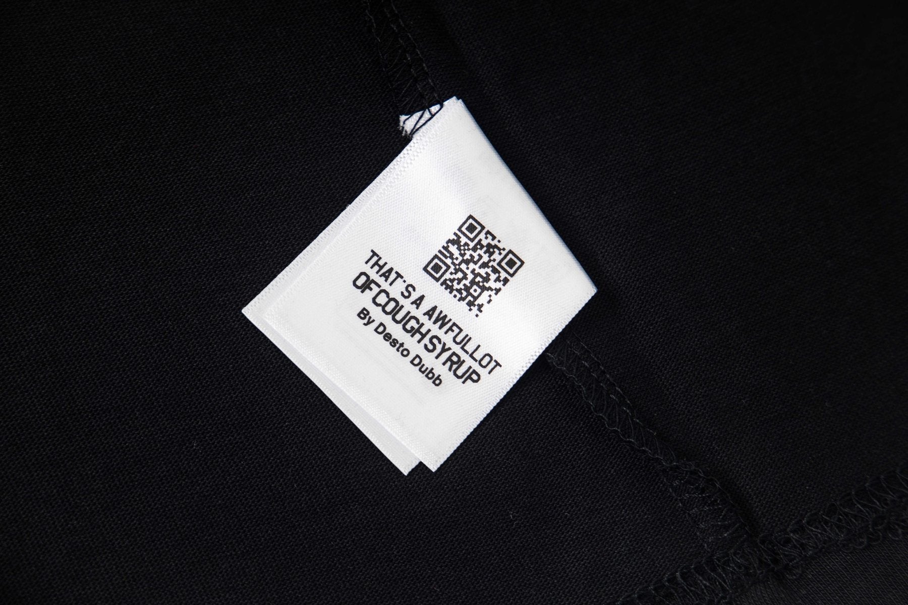 THAT'S A AWFUL LOT OF COUGH SYRUP Red/White Graphic Short-Sleeve T-Shirt — neck_label