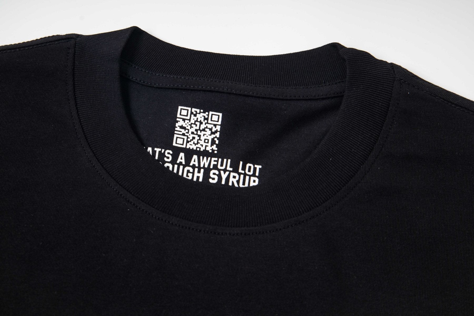 THAT'S A AWFUL LOT OF COUGH SYRUP Black Back-Print Short-Sleeve T-Shirt — neck_label