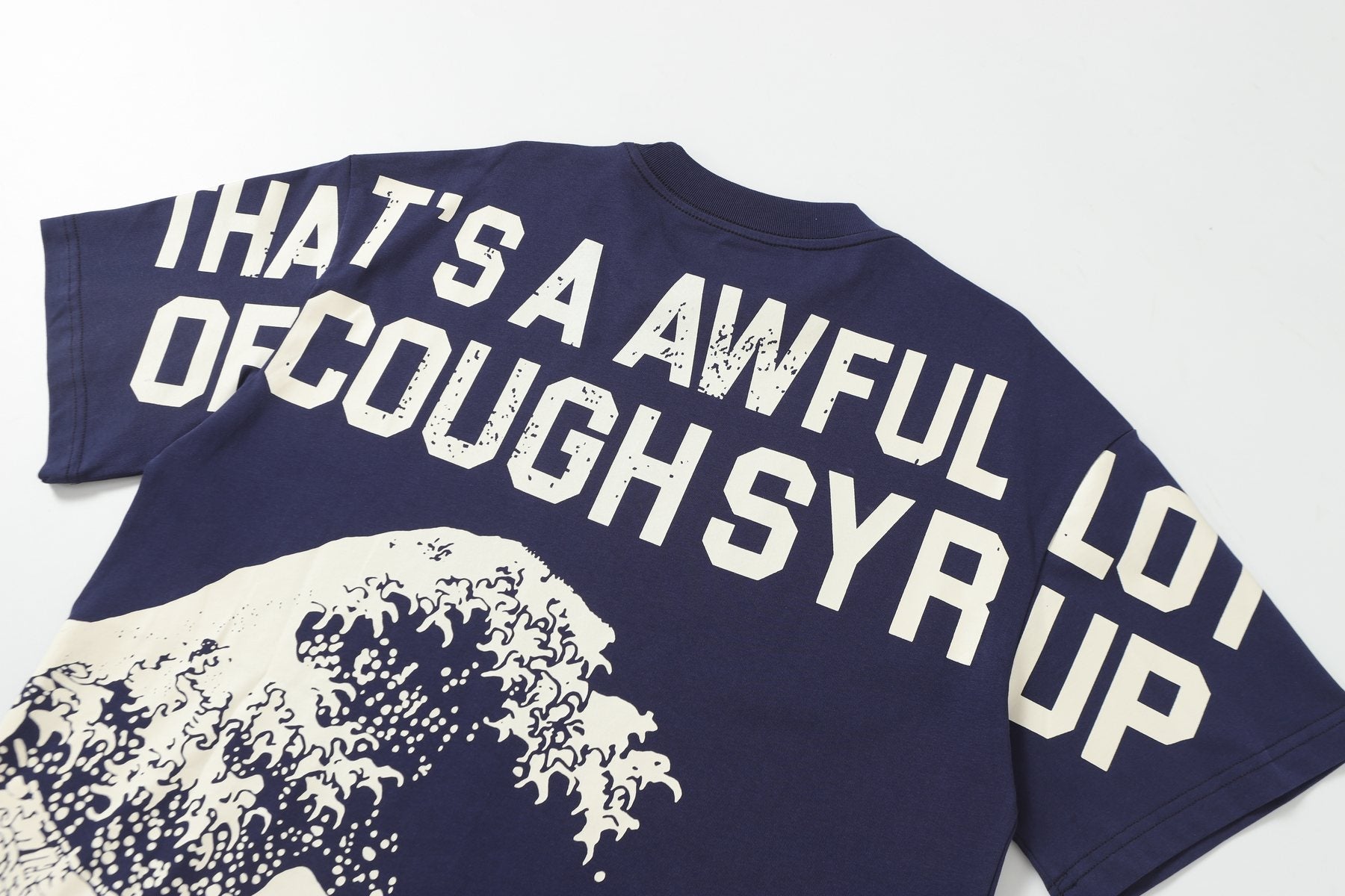 THAT'S A AWFUL LOT OF COUGH SYRUP Wave Graphic Short-Sleeve T-Shirt — detail
