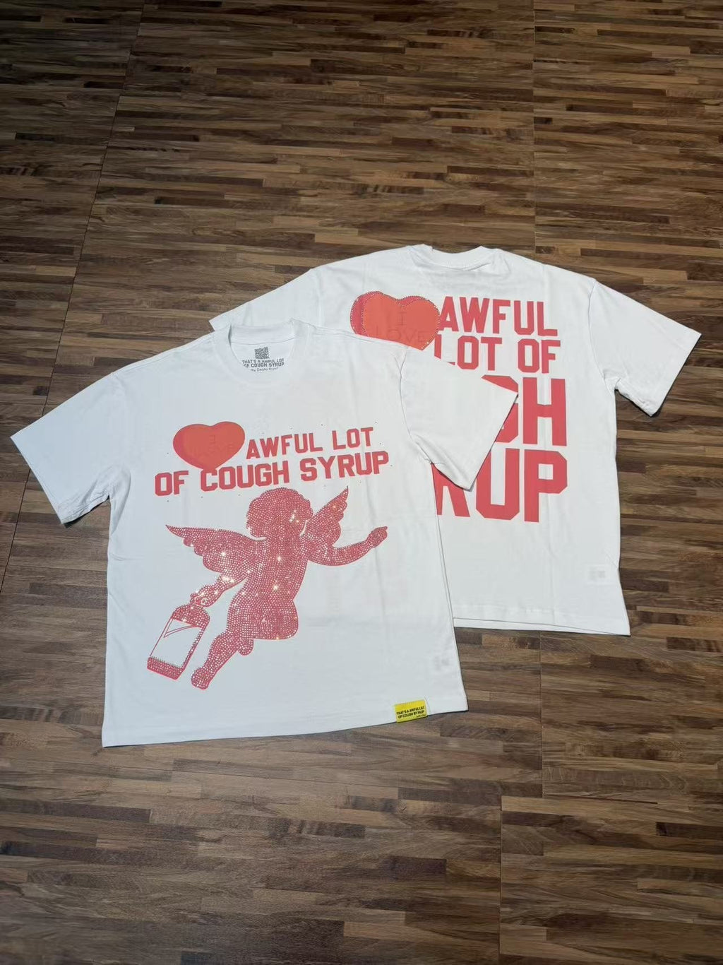 THAT'S A AWFUL LOT OF COUGH SYRUP Heart Cupid Graphic T-Shirt — context