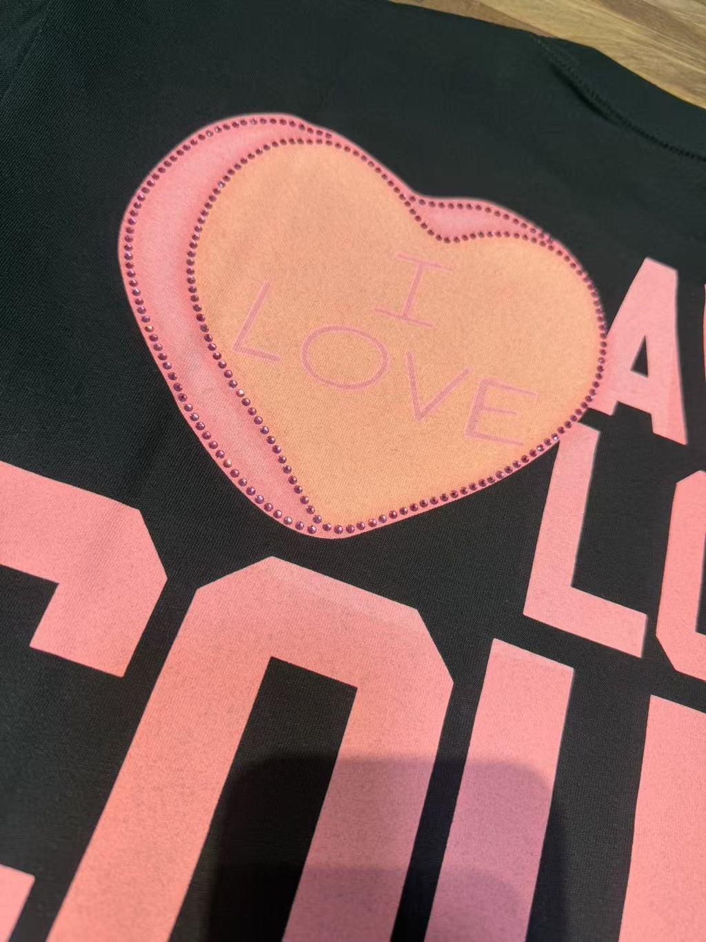 THAT'S A AWFUL LOT OF COUGH SYRUP Heart Cupid Graphic T-Shirt — fabric_closeup