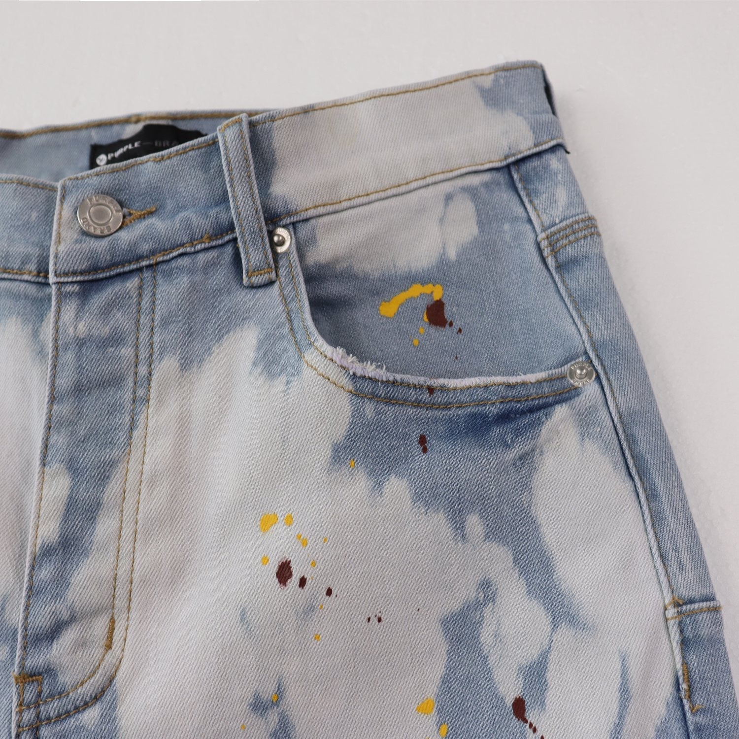Purple Brand Light Blue Bleached Paint Splatter Skinny Jeans — detail