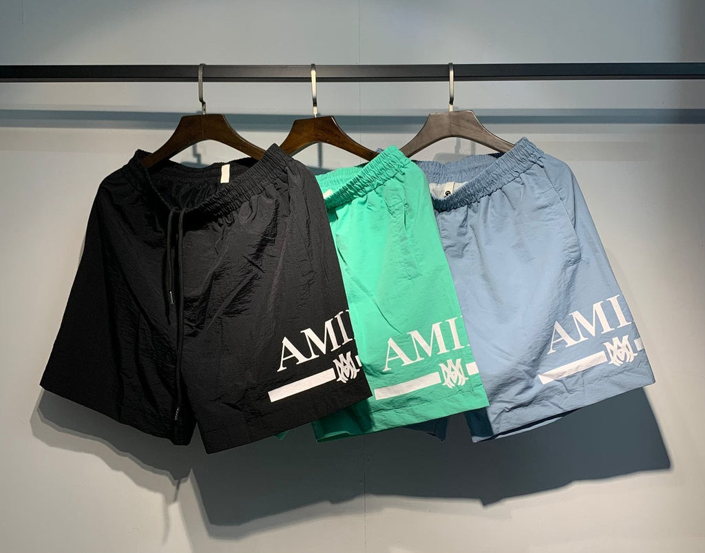 AMIRI Logo Graphic Shorts — comparison