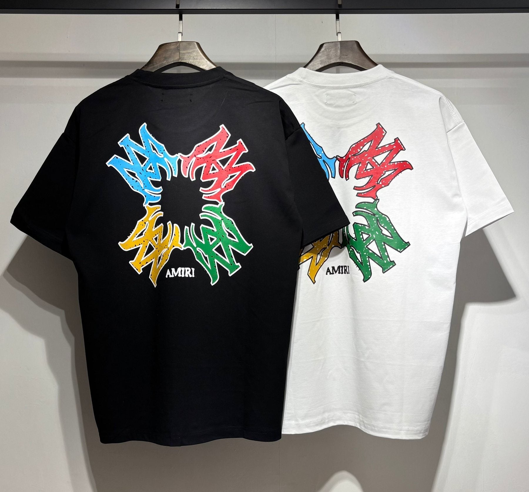 AMIRI Letter Graphic T-Shirt — comparison
