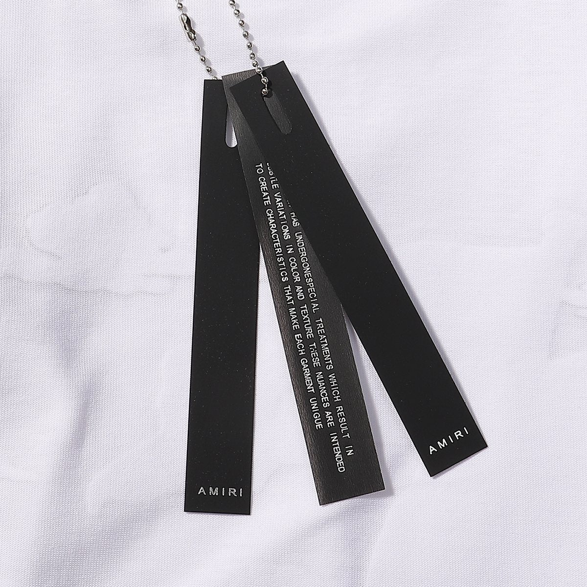 AMIRI Letter Graphic T-Shirt — hang_tag