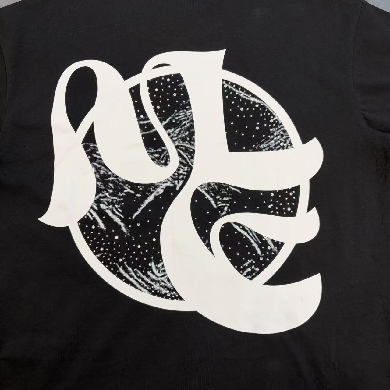 MIXED EMOTION Black Cherub Abstract Graphic T-Shirt — detail