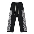 MIXED EMOTION Black Ornamental Graphic Sweatpants — hero