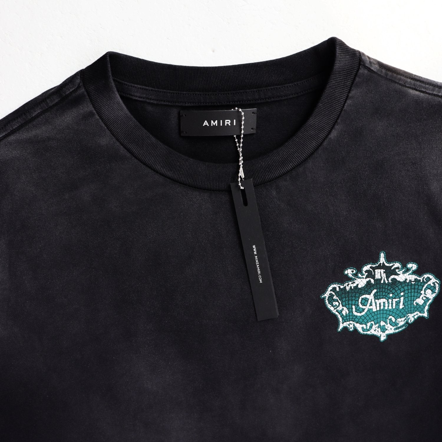 AMIRI The Chateau Badge Graphic T-Shirt — hang_tag
