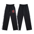 MIXED EMOTION Side-Tape Track Pants — hero