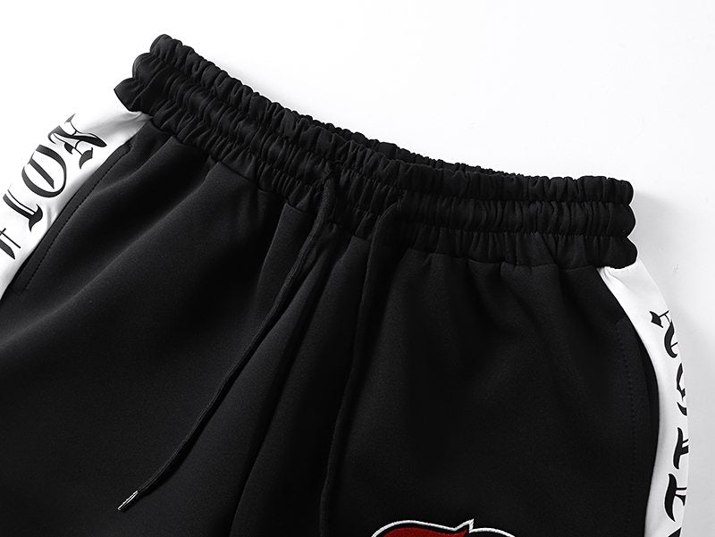 MIXED EMOTION Side-Tape Track Pants — detail