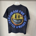 Rough Play Bandage Smile Graphic T-Shirt — hero