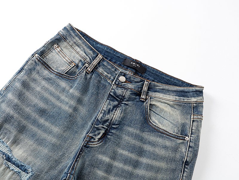 AMIRI Light Blue Distressed Letter Graphic Jeans — detail