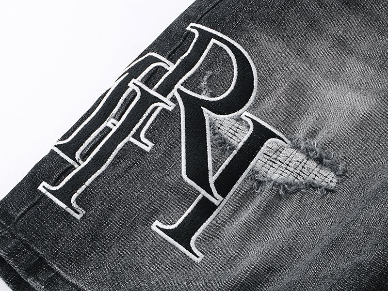 AMIRI Collegiate Graphic Denim Shorts - Black — detail