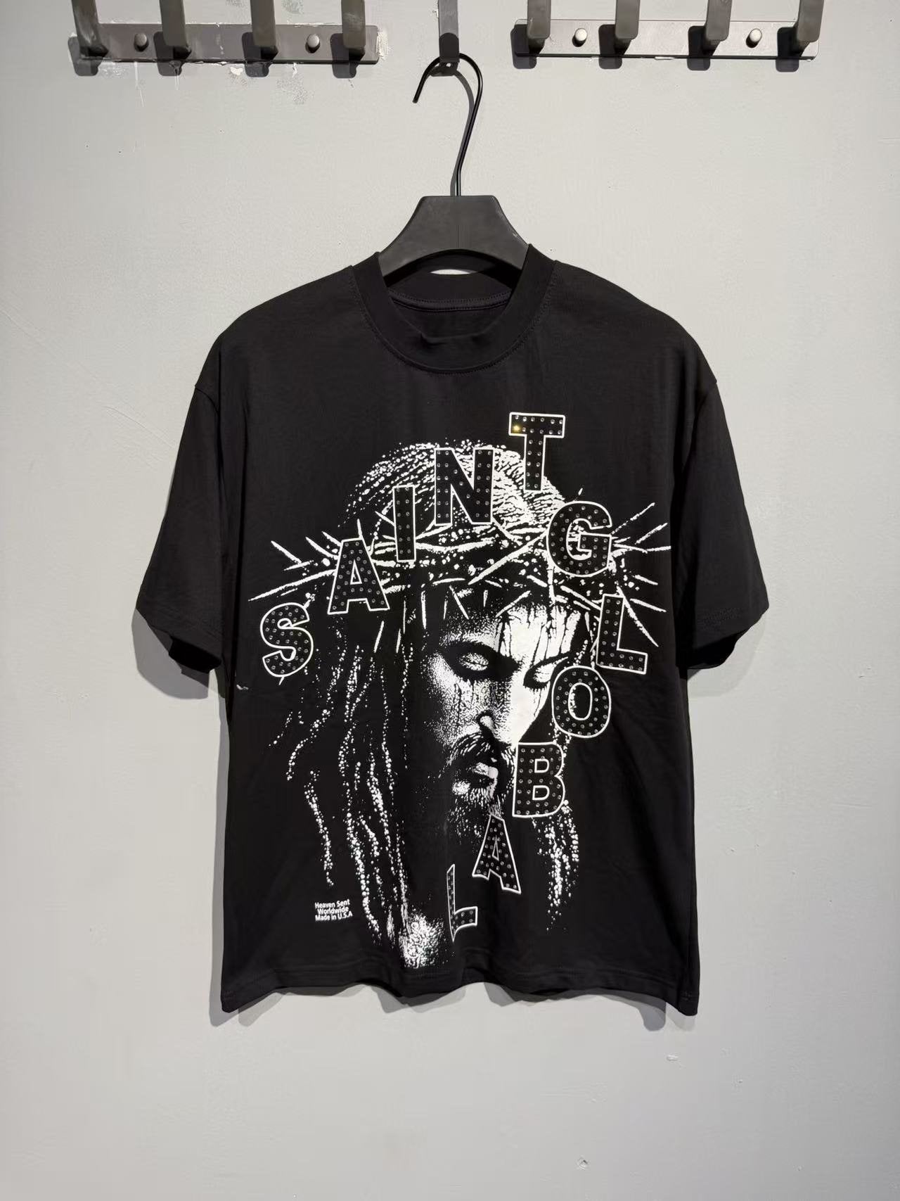 SAINT Monochrome Face Typography Graphic T-Shirt — hero