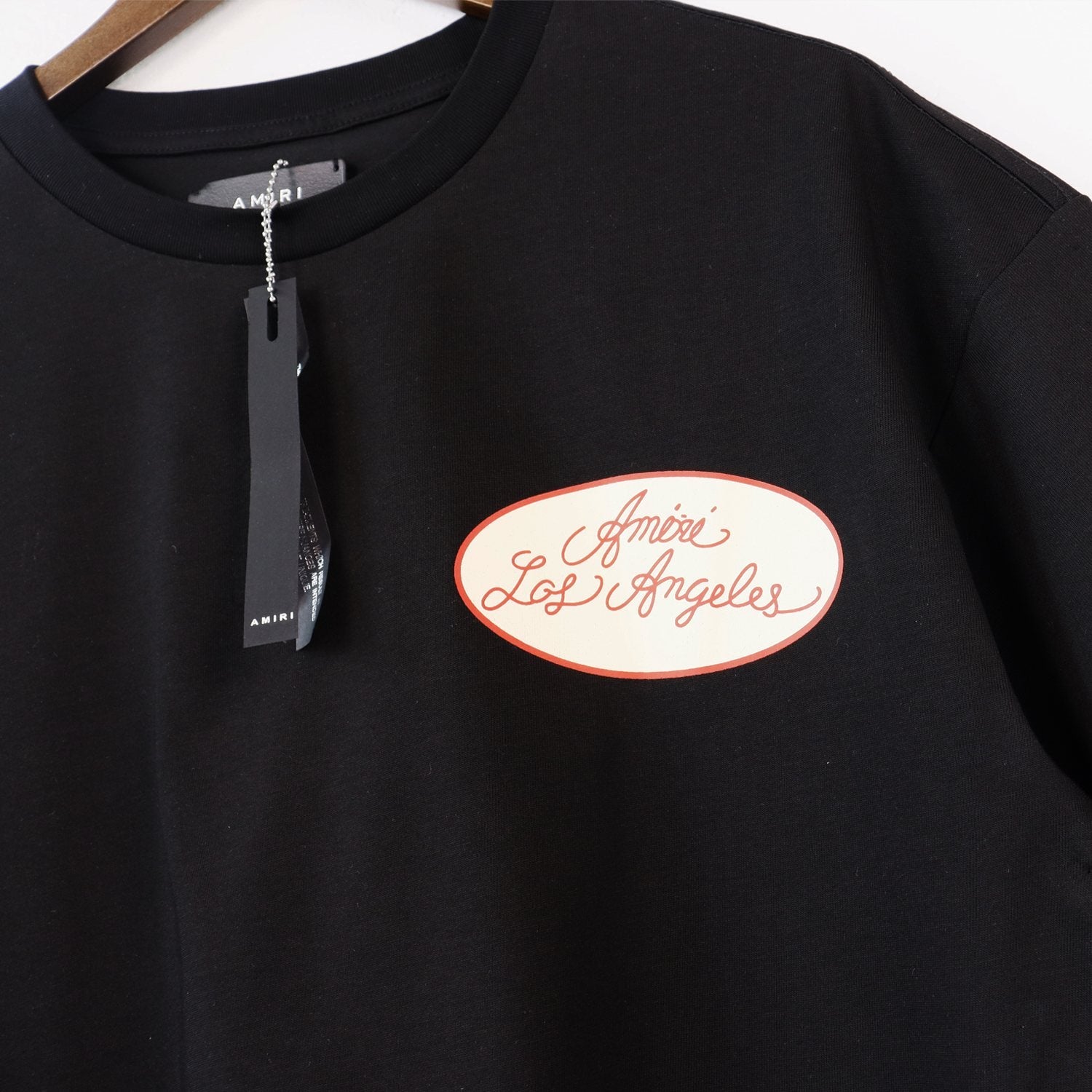 AMIRI Multi-Patch Back Graphic T-Shirt — hang_tag