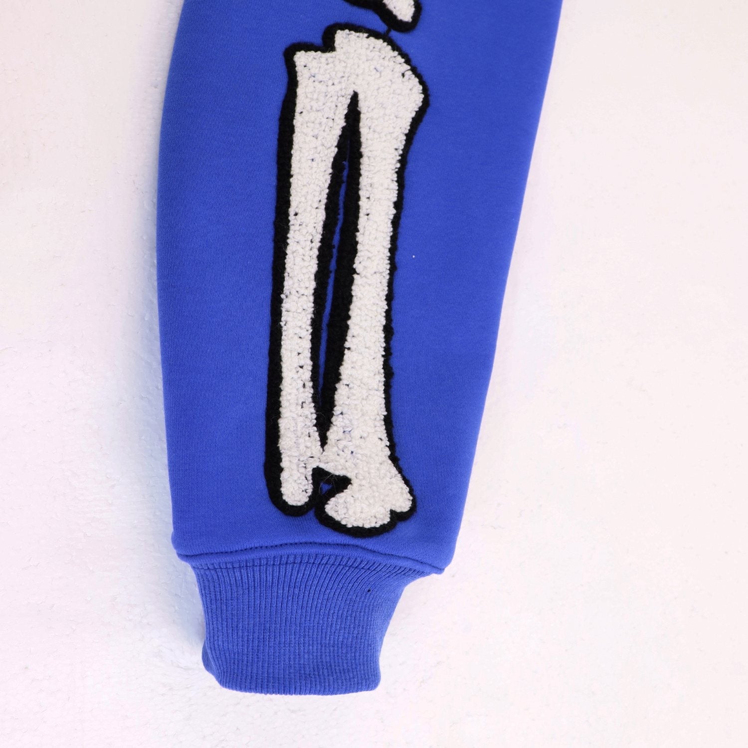 AMIRI Collegiate Bone Sleeve Graphic Hoodie — detail