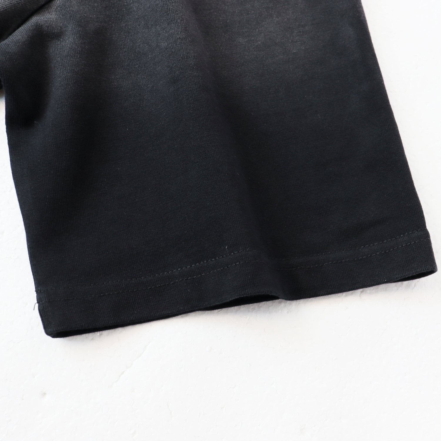 AMIRI Hollywood MA Graphic T-Shirt — fabric_closeup
