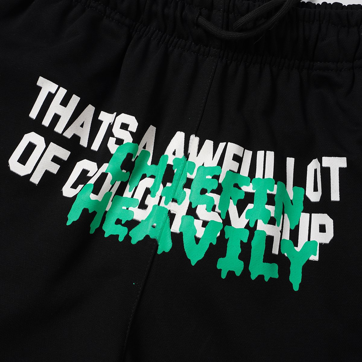 THAT'S A AWFUL LOT OF COUGH SYRUP Drawstring Graphic Shorts — detail