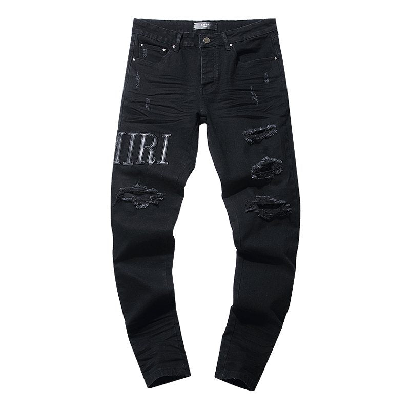 AMIRI Black Distressed Lettering Jeans — hero