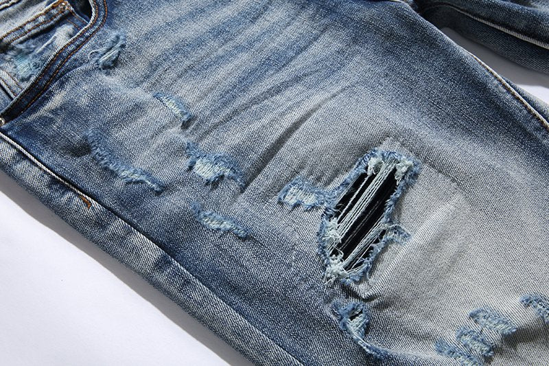 AMIRI Light Blue Distressed Jeans — detail
