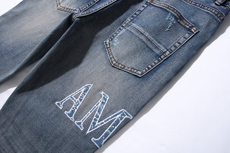 AMIRI Blue Washed Embroidered Jeans — detail