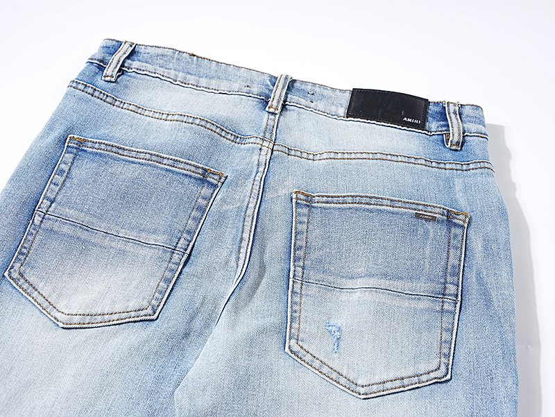 AMIRI Light Blue Distressed Paneled Jeans — detail