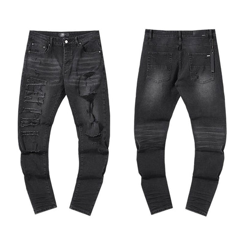 AMIRI Distressed Black Washed Jeans — hero
