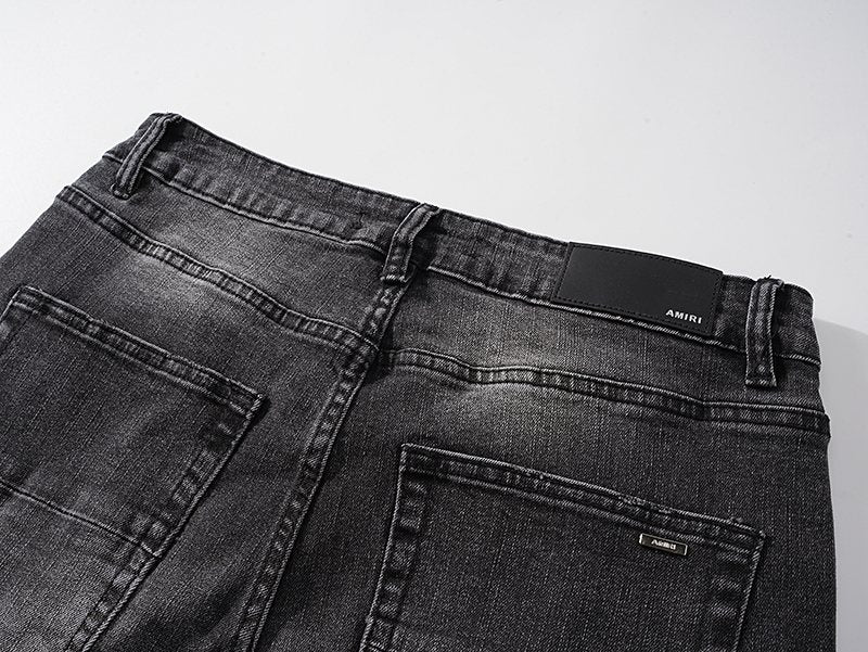 AMIRI Black Distressed Washed Jeans — detail