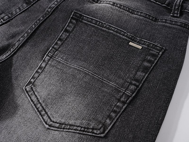 AMIRI Black Distressed Washed Jeans — detail