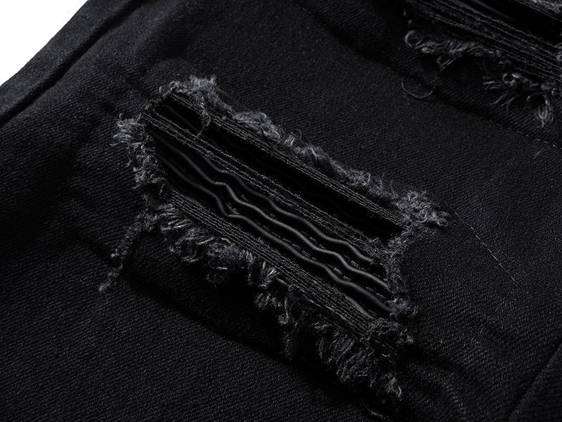 AMIRI Black Distressed Moto Jeans — detail