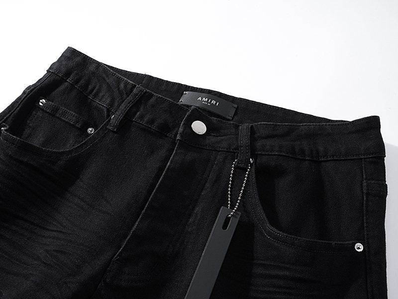 AMIRI Black Distressed Moto Jeans — detail