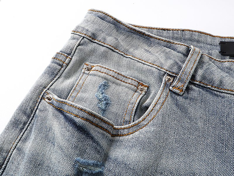 AMIRI Light Blue Distressed Paint Splatter Jeans — detail