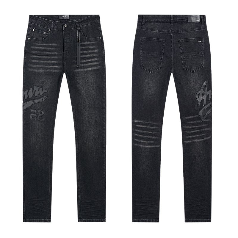 AMIRI Black Washed Graphic Jeans — hero