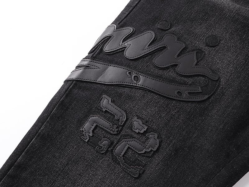 AMIRI Black Washed Graphic Jeans — detail
