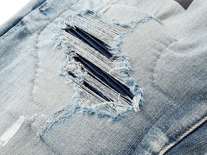 AMIRI Distressed Light Blue Jeans — detail